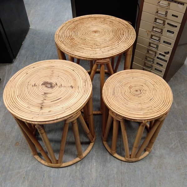Set of three vintage bamboo nesting tables.