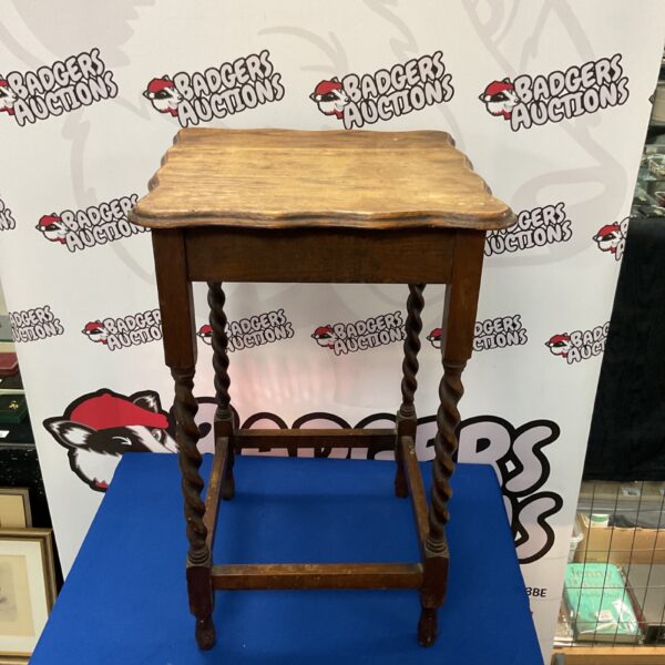 Antique barley twist oak table with carved legs.