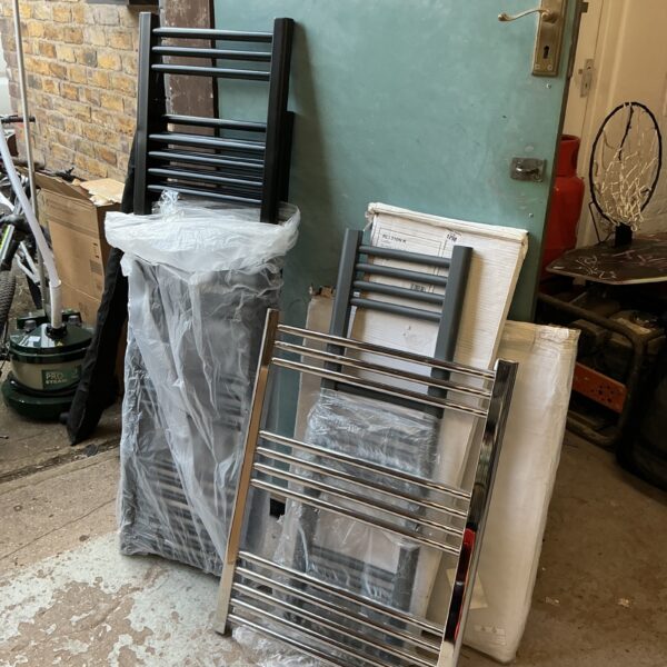 Job lot of chrome bathroom ladder radiators for heating and towel drying.