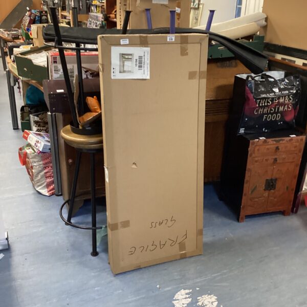 New boxed Helios 120 bathroom mirror ready for installation.