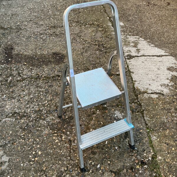 Silver Beldray aluminium step ladder, folded for storage.