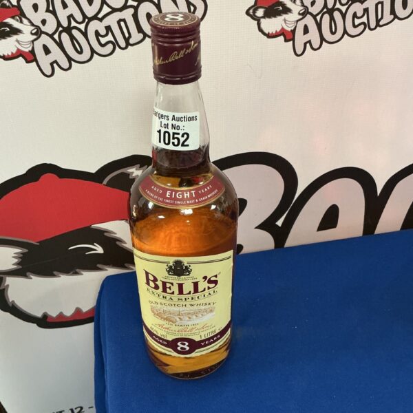 Litre bottle of Bells Whisky, vintage blended Scotch collectible.