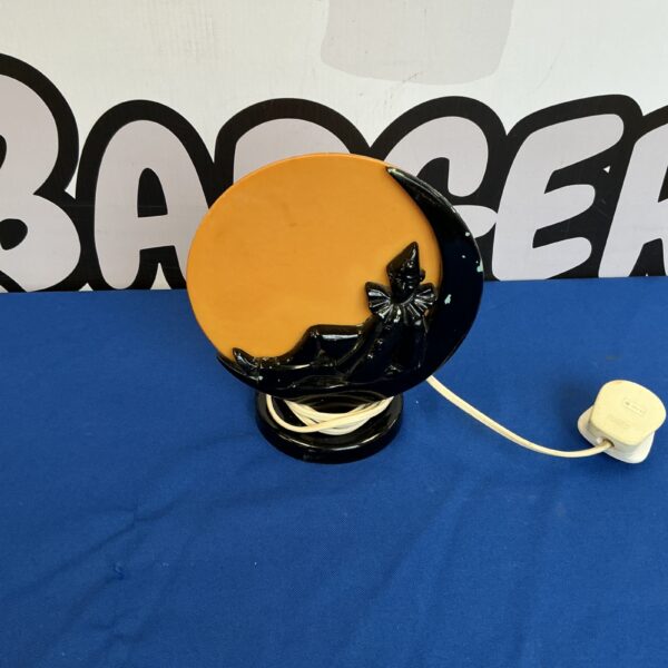 Vintage Bentina clown moon lamp with a playful design.