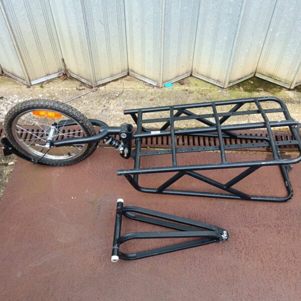 Used bicycle trailer frame with single wheel and hitch.