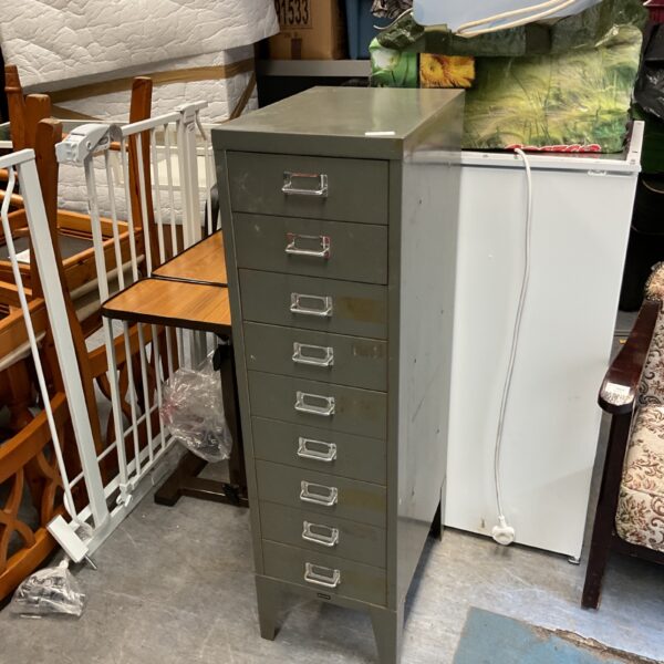 Front view of a vintage Bisley machinist cabinet with nine drawers.