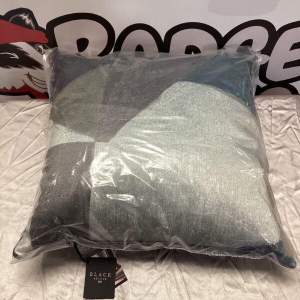 Close-up of a sleek black edition cushion for home decor.