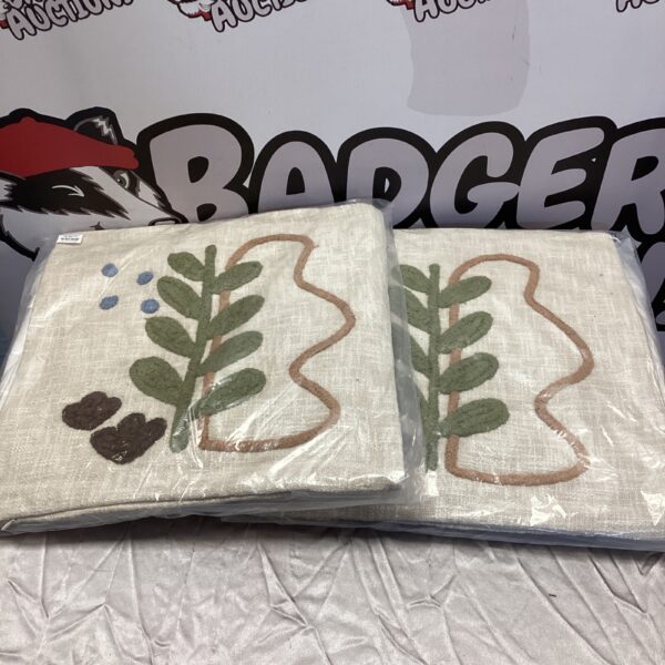 Bloomingville cushion covers with a subtle floral pattern for home decor.