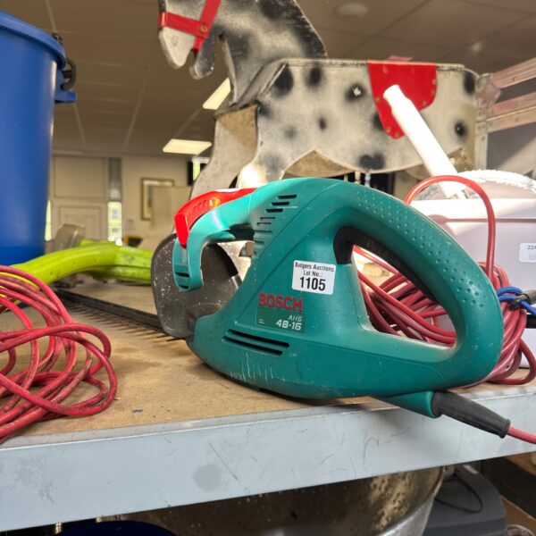 Used Bosch AHS 48-16 electric hedge cutter for garden trimming.