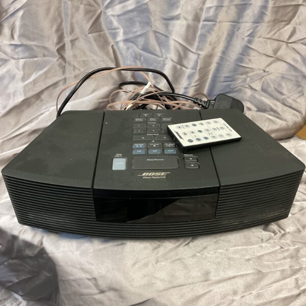 Vintage Bose Wave Radio CD system with remote control.