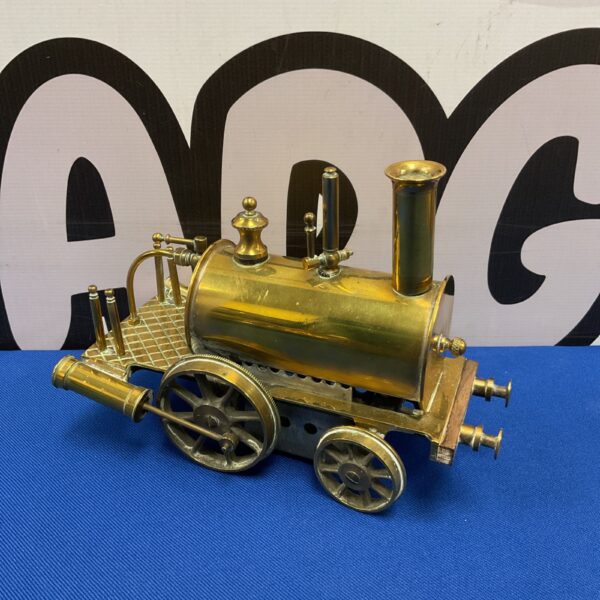 Detailed brass steam engine model with polished finish.