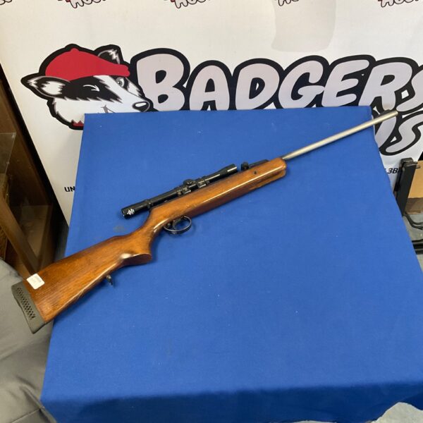 Vintage BSA .22 calibre air rifle with scope for sale.