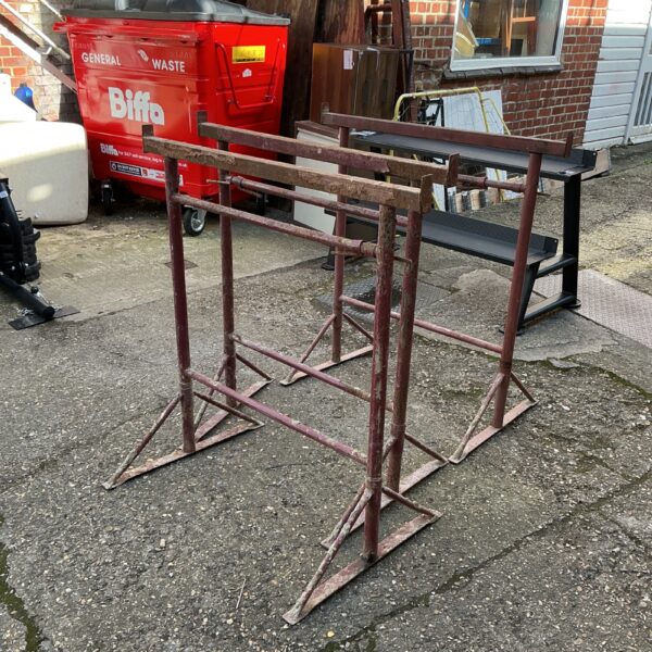 Lot of three vintage metal builders trestles for workshop use.