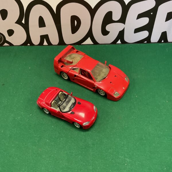 Red Burago Ferrari F40 diecast model, detailed sports car.