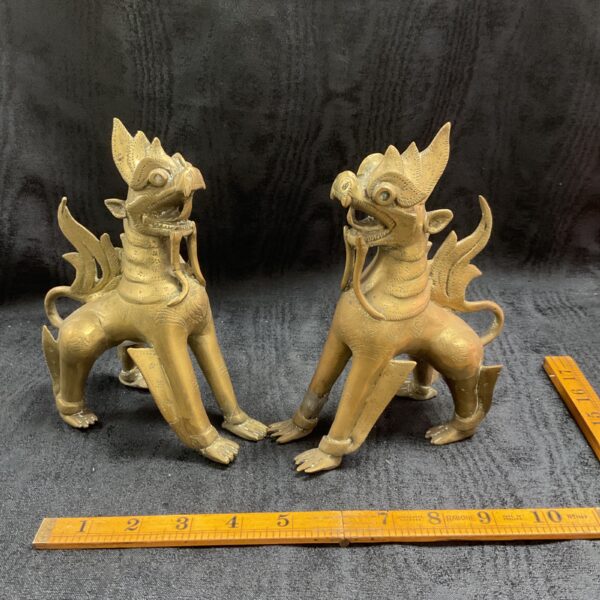 Antique Burmese Chinthe lion sculpture in brass, detailed carving.