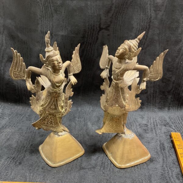 Antique Burmese Garuda statue, detailed bronze mythical bird figure.