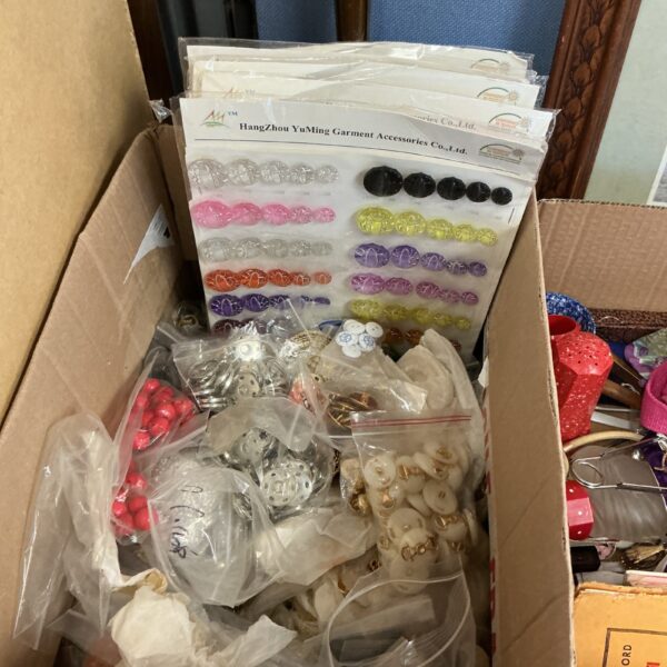 Large lot of mixed buttons and press studs for sewing and crafting projects.