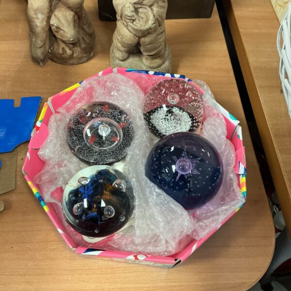 Lot of four colourful Caithness Glass paperweights for collectors.
