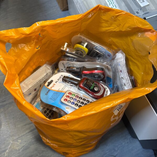 Lot of new car MP3 players in original packaging.