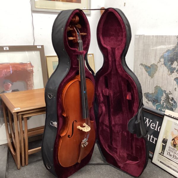 Gear4music child’s cello in open case, musical instrument.
