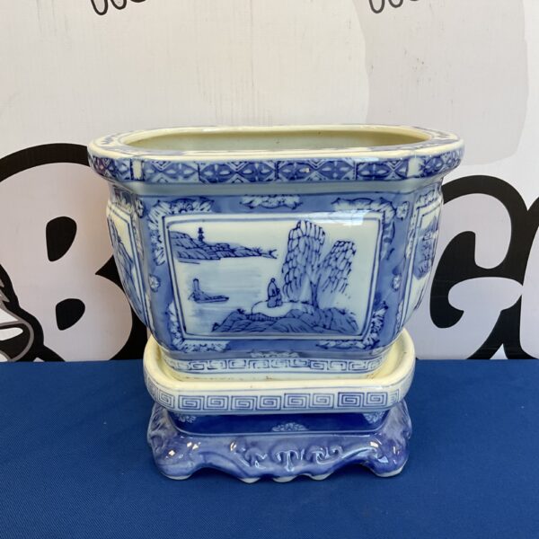 Antique Chinese blue and white porcelain planter with landscape design.