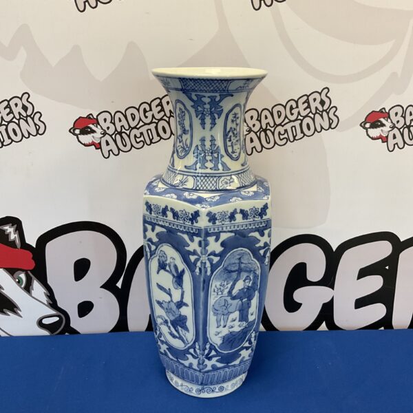 Antique Chinese blue and white porcelain vase with intricate designs.