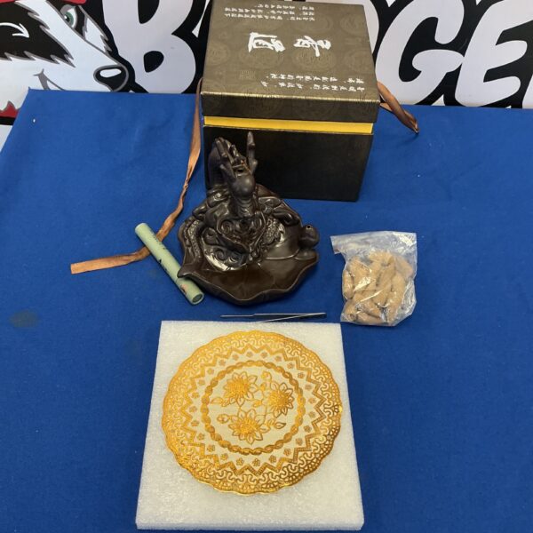 Detailed Chinese dragon incense holder kit with incense sticks.