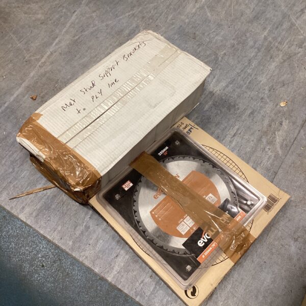 Lot of three chop saw blades and support brackets for DIY projects.