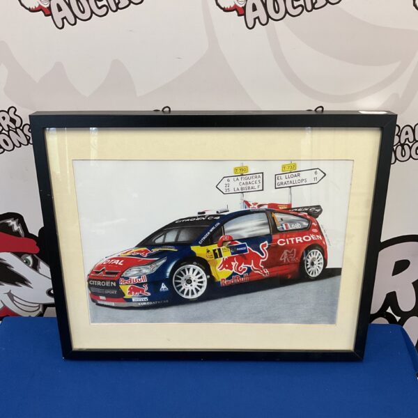 Framed Citroen rally print, vibrant motorsport art for car enthusiasts.