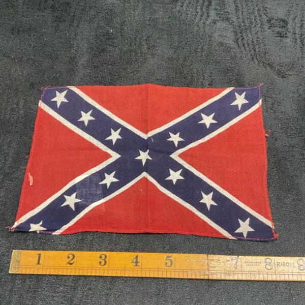 Vintage Confederate table flag with Stars and Bars design.