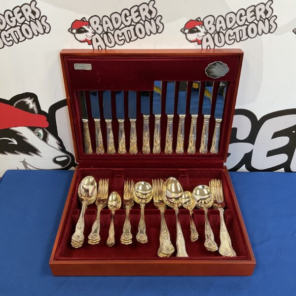 Vintage Cooper Ludlam A1 silver plate cutlery set displayed.