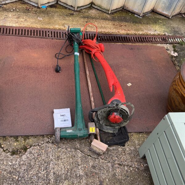 Used Coopers electric edger with strimmer head for garden maintenance.