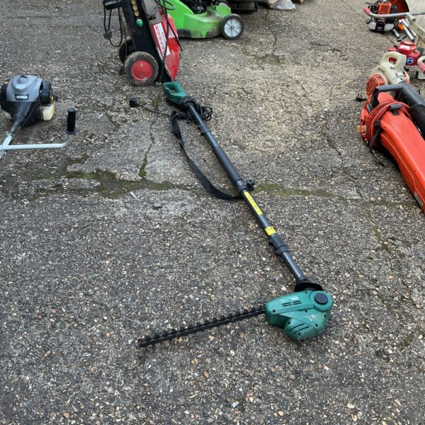 Used Coopers electric telescopic hedge trimmer for garden maintenance.