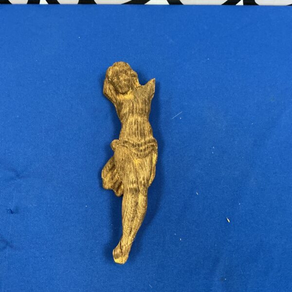 Vintage Corpus Christi figurine, detailed religious sculpture.