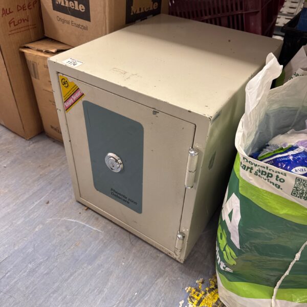 Used Datacare valuables safe with keyhole and handle.