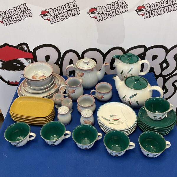 Vintage Denby stoneware pottery tea and coffee set collection on display.