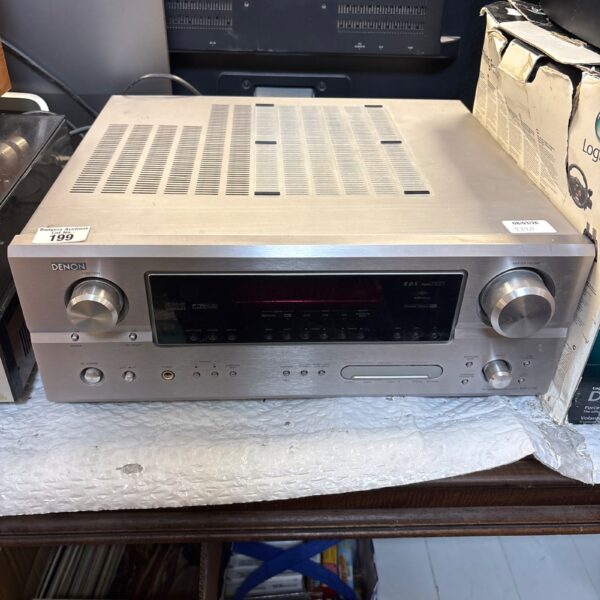 Silver Denon AVR-2106 AV receiver for surround sound systems.