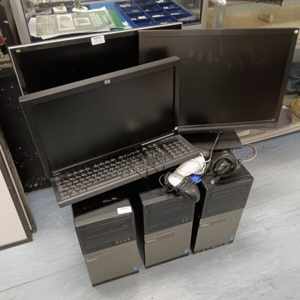 Desktop computer lot with monitor and keyboard setup.