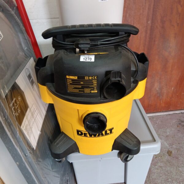 Yellow and black DeWalt DCV100 vacuum cleaner body for workshop use.