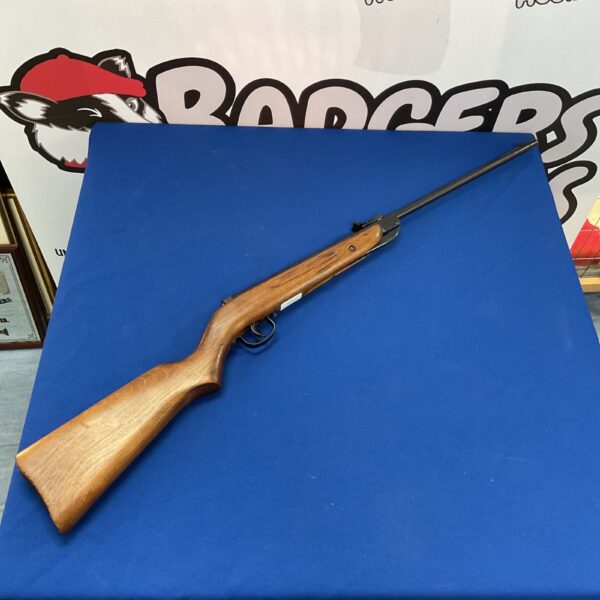 Vintage Diana model 25 air rifle with wooden stock.
