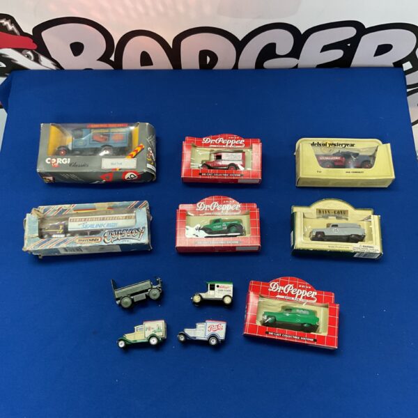 Vintage diecast model collection featuring Corgi and Matchbox vehicles.