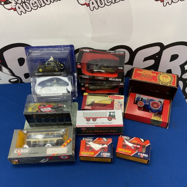 Diecast vehicle lot featuring Corgi and Matchbox models.
