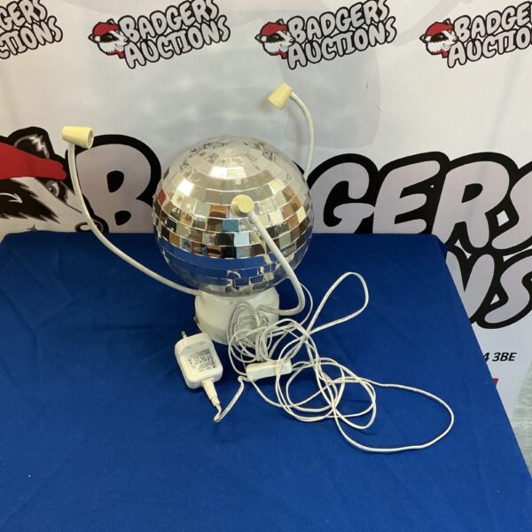 Vintage disco ball with mirrored surface for party lighting.