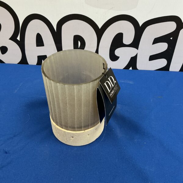 Handmade ceramic candle holder by DomeDeco for warm ambient lighting.