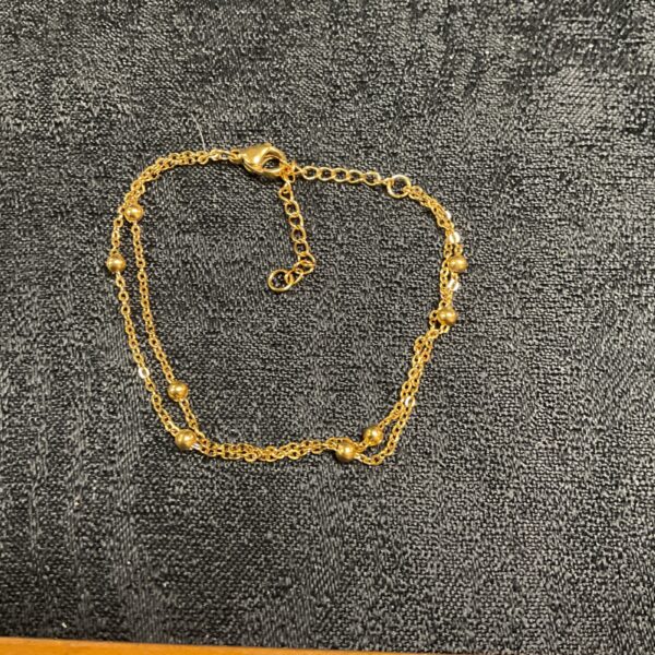 Gold plated double chain bracelet, delicate fashion jewellery.