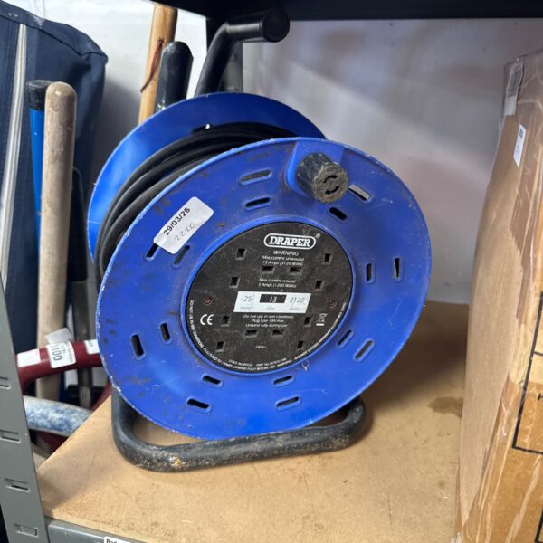 Draper 4 gang extension reel, blue, for workshop or outdoor use.