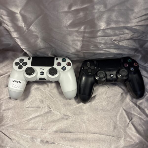 Pair of used Sony DualShock 4 controllers for PlayStation 4 gaming.