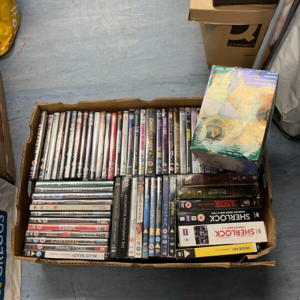 Tray of DVD box sets including Sherlock series.