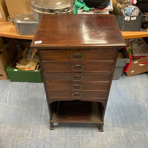 Antique Edwardian mahogany music cabinet with five drawers.