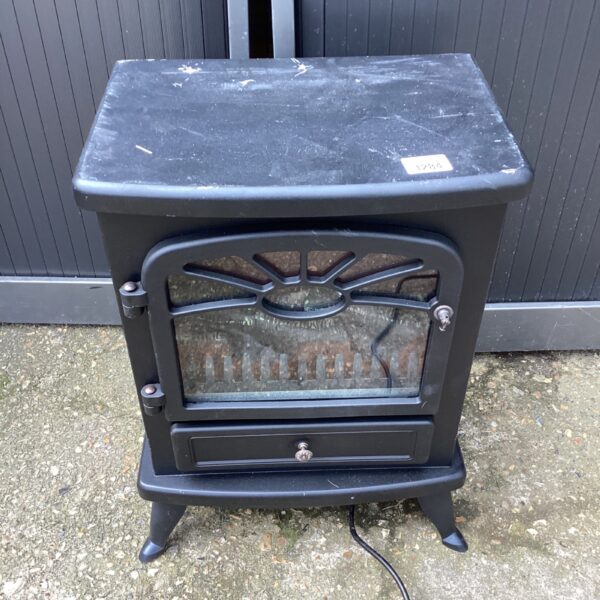 Vintage electric fireplace with dark finish and flame effect.
