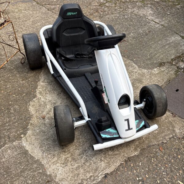Red and black electric go kart for kids, cycle sport model.